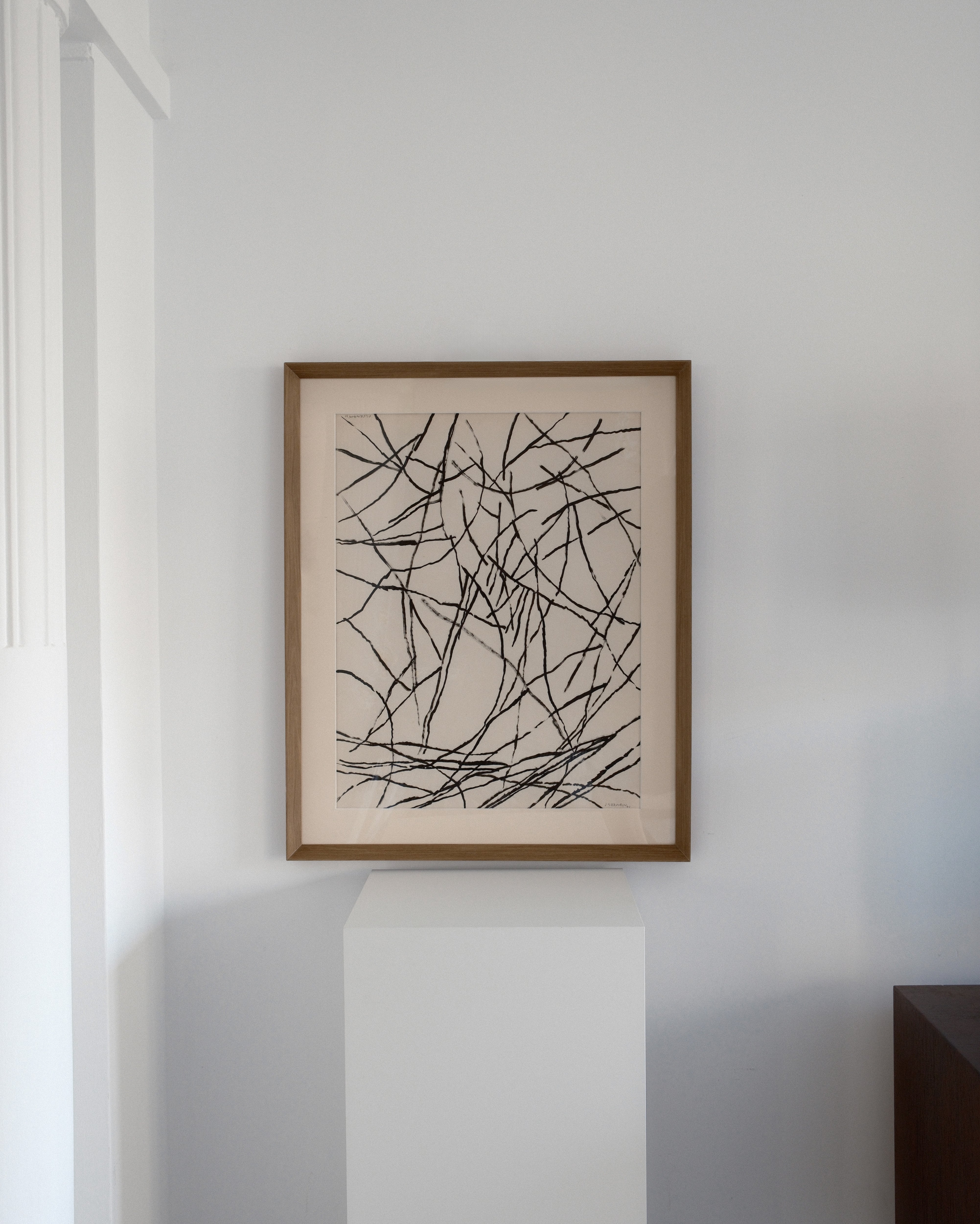 Jacques Germain ink on paper — installation view of framed lyrical abstract drawing