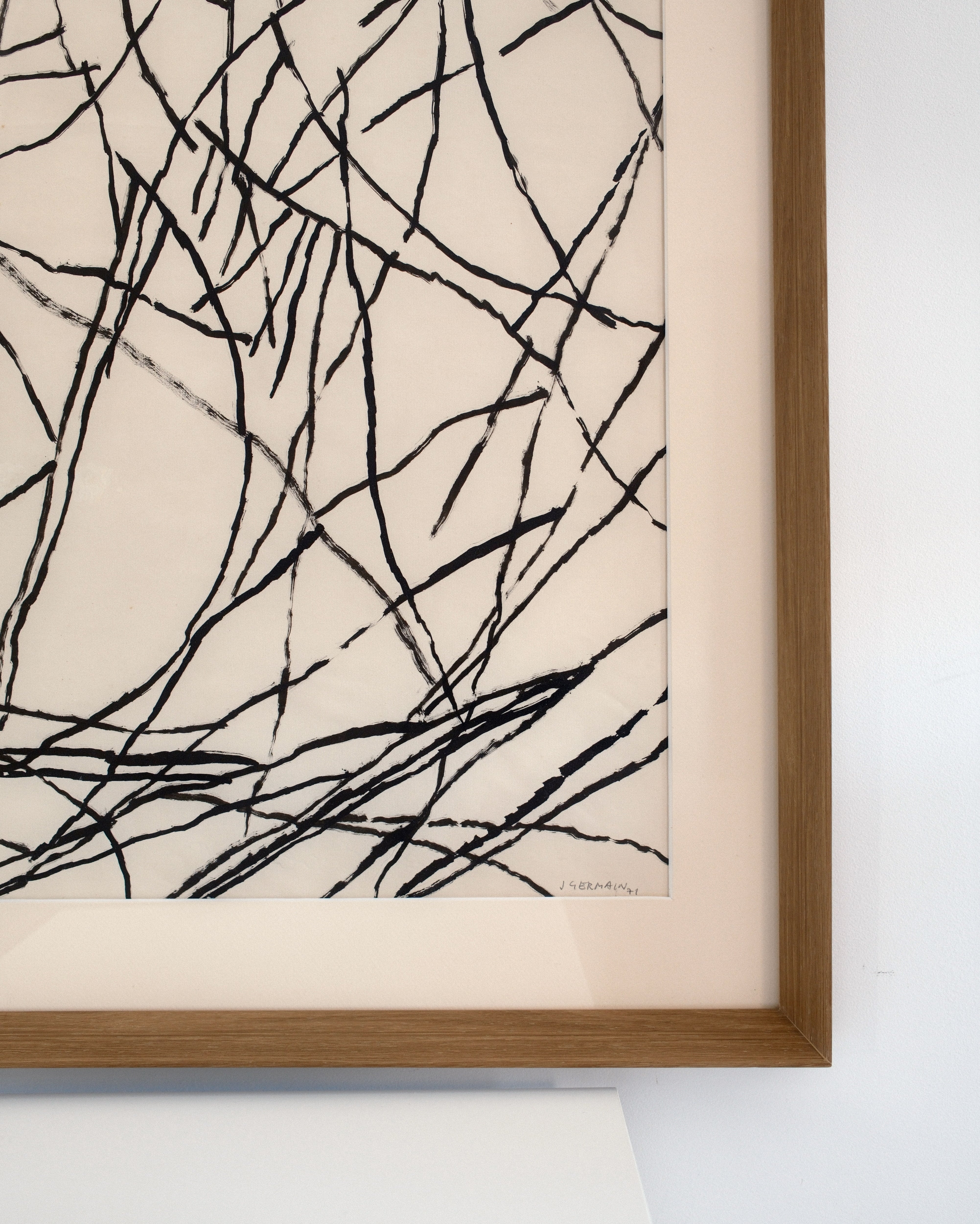 Jacques Germain ink on paper — close-up of intersecting black ink lines and framed edge