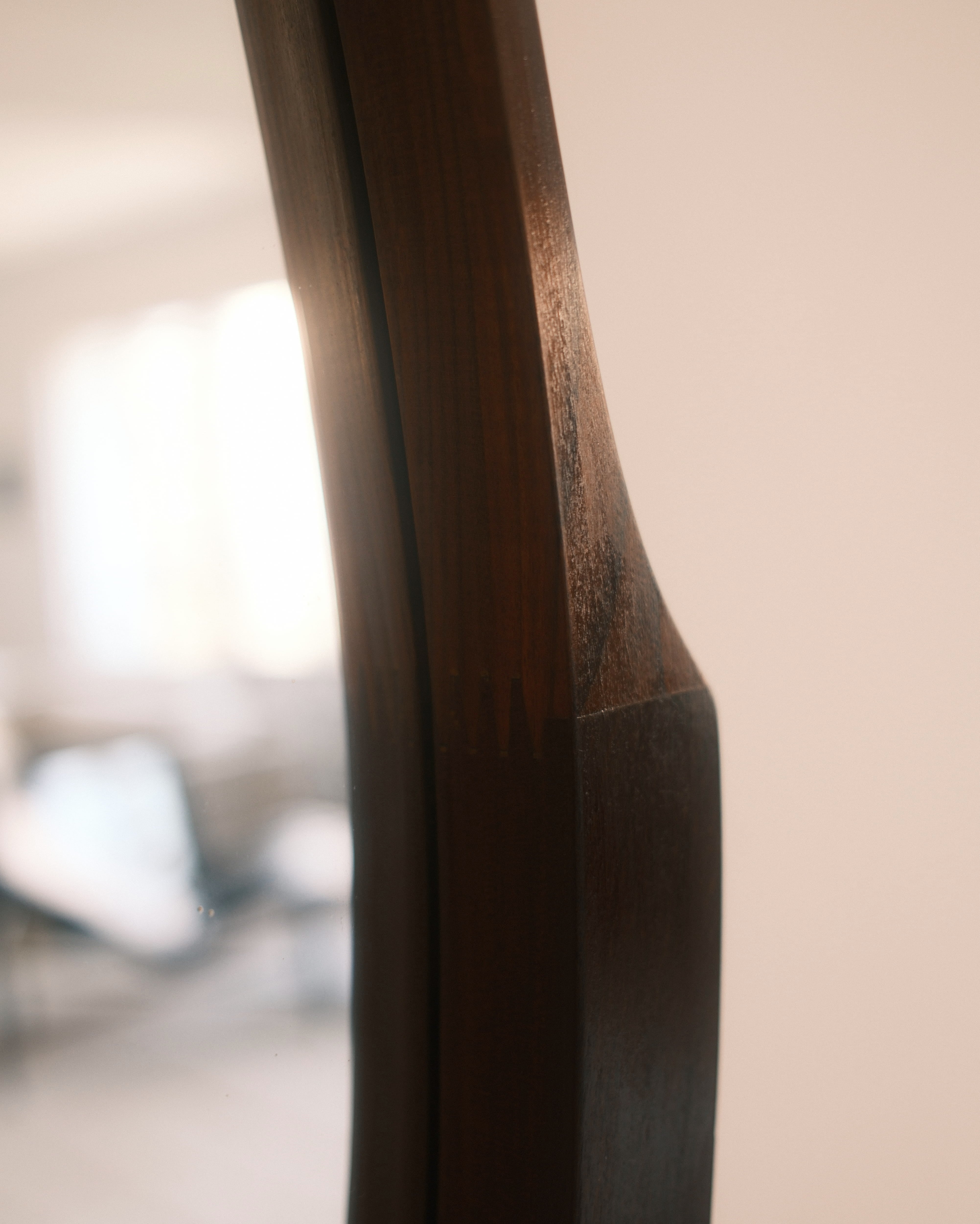 Mid-Century wall mirror — side profile detail of solid teak frame