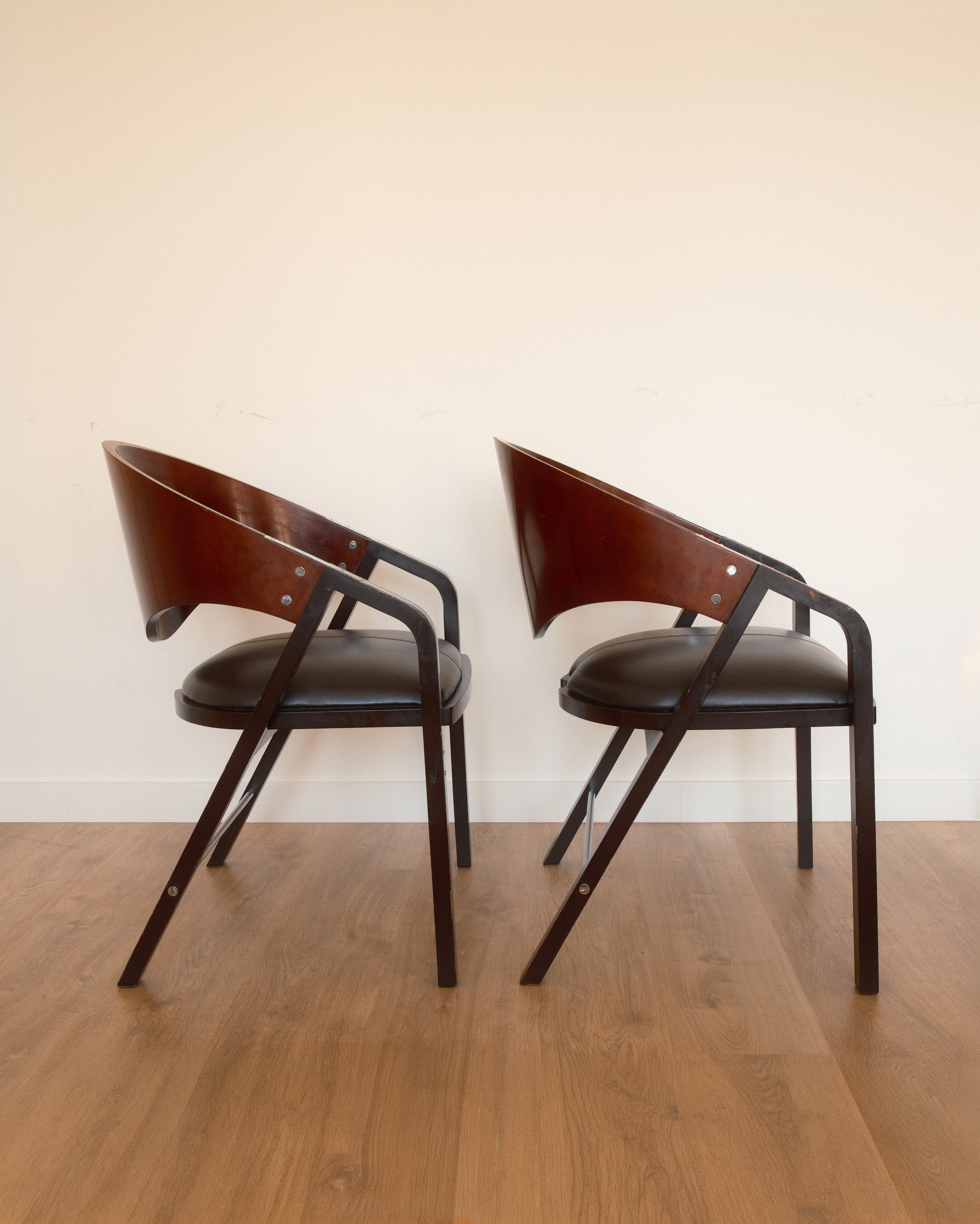 Jaume Tresserra Spinnaker armchairs — pair shown in side profile