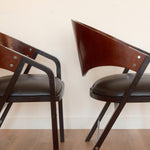 Jaume Tresserra Spinnaker armchairs — detail of curved armrest and upholstered seat