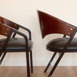 Jaume Tresserra Spinnaker armchairs — detail of curved armrest and upholstered seat