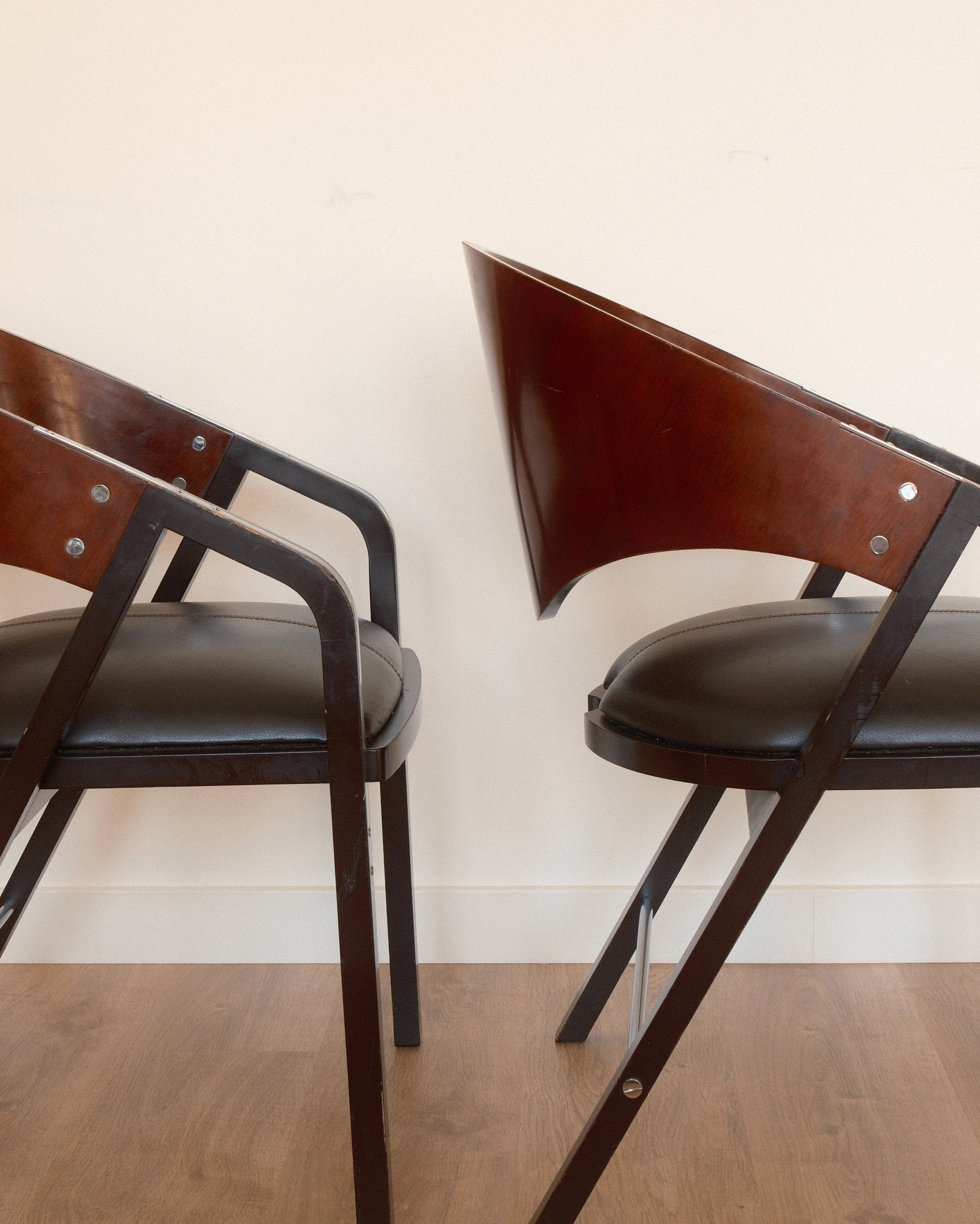 Jaume Tresserra Spinnaker armchairs — detail of curved armrest and upholstered seat