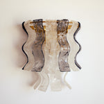 Murano glass wall lights — front view of sculptural glass sconces
