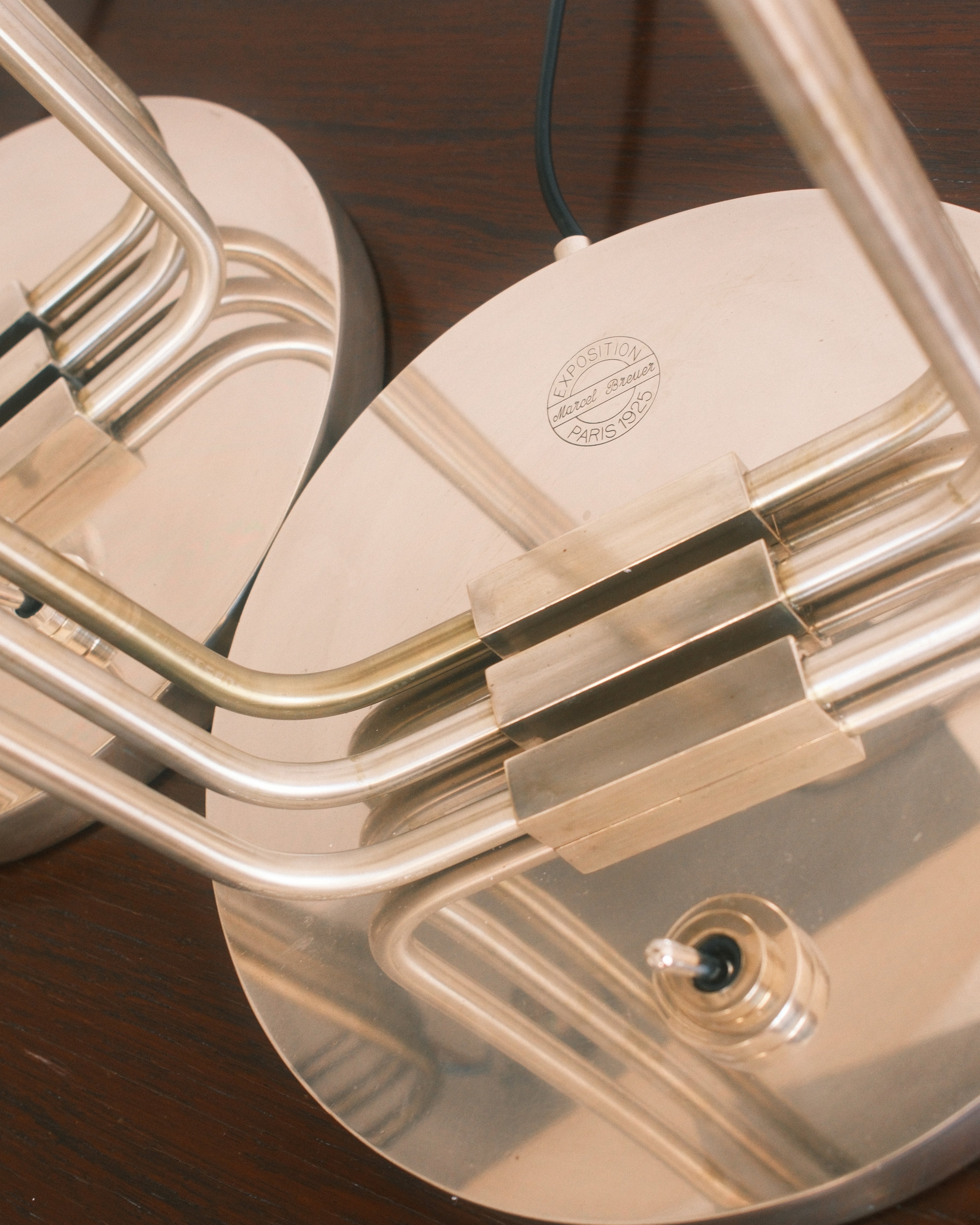 Art Deco table lamps — engraved maker's mark detail