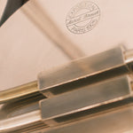 Art Deco table lamps — close-up of stamped manufacturer marking