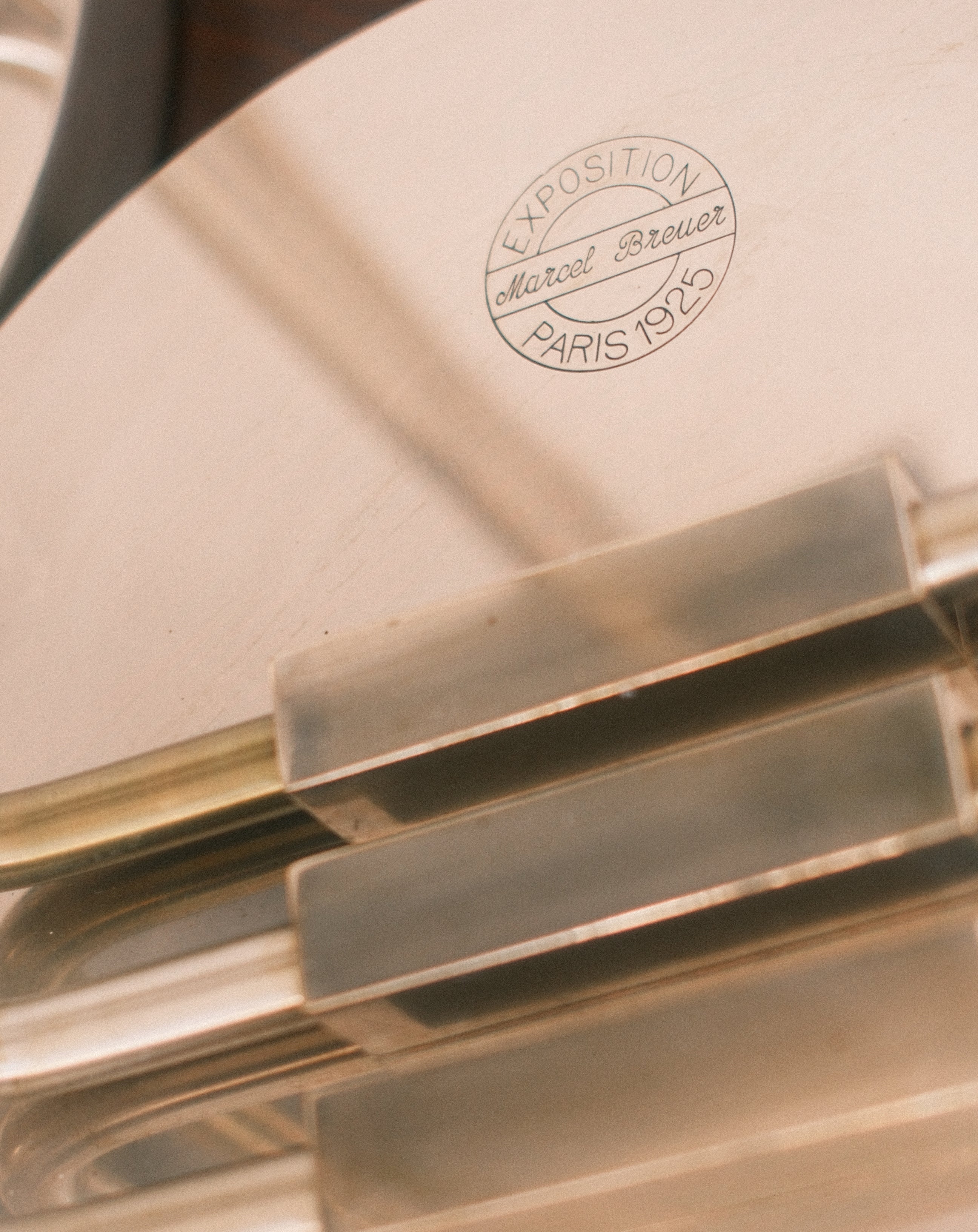 Art Deco table lamps — close-up of stamped manufacturer marking