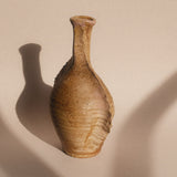 A sculptural vase in patinated stoneware with delicate pink reflections, made in Puisaye